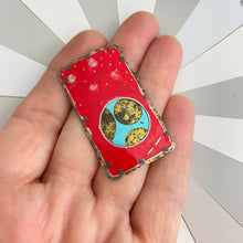 Load image into Gallery viewer, Weathered Red Over Icy Blue Encircled Upcycled Tin Brooch
